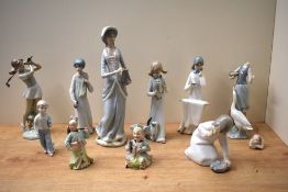 A group of eight Lladro porcelain and similar figures/figurines to include 'Little Girl with