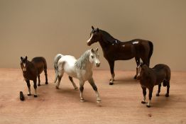 A group of four Beswick Pottery and similar horse studies to include Arab 'Bahram' model number
