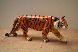 A Goebel pottery Tiger study, modelled in stalking pose, marked to underside, measures 48cm x 18cm.