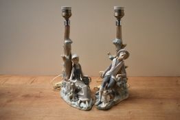 Two Lladro figural table lamps comprising 'Shepherd Boy with Dog' and 'Girl and treetrunk' both