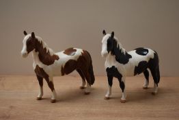 A Beswick Pottery Piebald Pinto Pony sold alongside a Beswick Pottery Skewbald Pinto Pony both model
