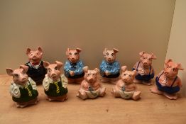 Two near full collections of Wade for Natwest ceramic piggy banks, comprising 'Sir Nathaniel' x1, '