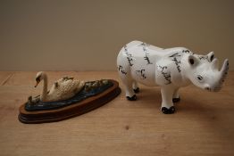 A Border Fine Arts orinthological group 'Swan and Cygnets' designed by Ray Ayres sold alongside a