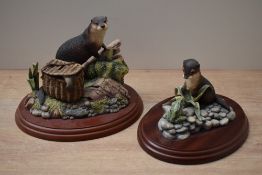 Two Border Fine Art animal studies 'The Poacher' model number A0003 designed by Ray Ayres and 'Otter