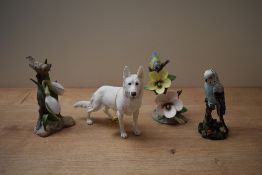 A Leonardo Collection white German shepherd study sold alongside three porcelain bird studies,
