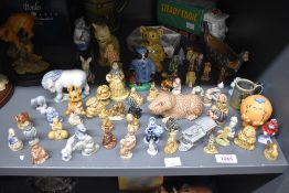 A large selection of Wade English porcelain whimsies and similar to include Little Miss Fun,