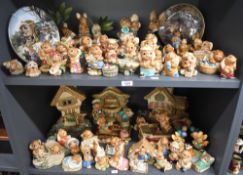 A large assortment of Pendelfin rabbit studies to include 'Little Mo', 'Mother & Baby', 'The