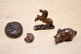 Four 20th-century boxwood Japanese Netsuke animal figures, to feature a horse, a coiled snake, a