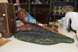 A large late 20th-century cast plaster pheasant figurine, featuring colourful hand painted detailing