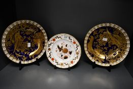 Two late 20th-century Royal Crown Derby 'Paradise Cobalt' English bone china plates, to feature
