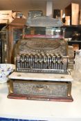 A Victorian American National Cash Register Company brass cash register, the top section opening