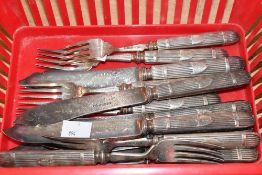 A small quantity of Victorian silver-plated metal knifes and forks, to feature ornate foliate and