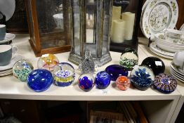 A selection of 20th-century art glass paperweights, to feature two fine Millefiori examples; a