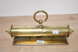 A late 19th to early 20th-century brass solicitors office paperweight, of cylindrical shape,