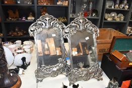 Two late 20th-century Art Nouveau-style table top vanity mirrors, featuring a reclining female