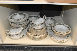 A selection of 20th-century Royal Doulton 'Larchmont' translucent china dinner wear, featuring
