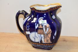 An early 20th-century Royal Doulton 'Classical Greece' ceramic pitcher, featuring a deep cobalt blue
