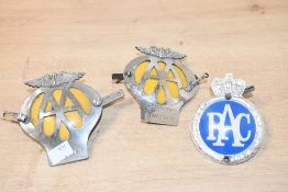 Two 20th-century British Automobile Association metal car badges, having a chrome finish, yellow