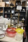 A selection of late 19th to 20th-century brass oil lamps, to feature a vintage Tilley Lamp With