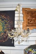 A late 20th-century Italian Maria Theresa-style crystal cut glass chandelier, featuring five