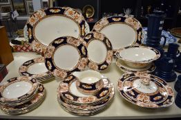 A selection of Royal Cameron (Alfred Meakin) 18kt gold embellished Imari pattern dinner wares,