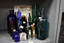A fine collection of late 19th to 20th-century glass bottles, to feature an array of shapes, sizes