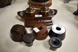 A selection of 20th-century Bakelite desktop wares, to include two GadeWare pen holders and a