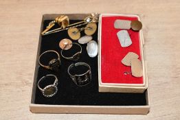 A small collection of jewellery, including a pair of silver cufflinks, rings and stick pins