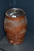 A Victorian salt-glazed stoneware spirit barrel, of traditional form, moulded in relief with the