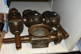 Four late 19th-century brass carriage lamps/lanterns, unmarked, (4), condition is consistent with