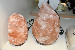 Two contemporary Himalayan salt lamps, of varying sizes, unmarked, (2), condition is consistent with