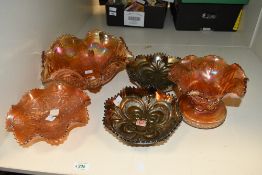 A selection of 20th-century Fenton-style carnival glass bowls, to include a Northwood Marigold