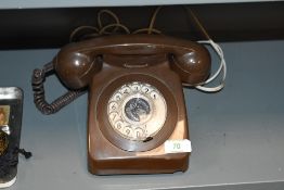 A vintage British Telecom Brown Rotary Telephone, having a 1977 The Queen's Silver Jubilee rotary