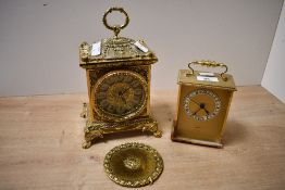 Two late 20th-century gilt metal carriage clocks, to feature an ornate French-style example and a