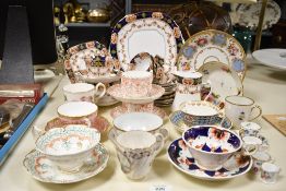 A selection of late 19th to early 20th-century porcelain teacups and saucers, to feature a Royal