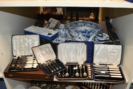 A large selection of late 19th to 20th-century metalware, mainly comprising knives and teaspoons;