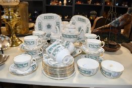 A Coalport Bone China 'Revelry' Adam Green pattern part tea service, comprising fourteen cups,