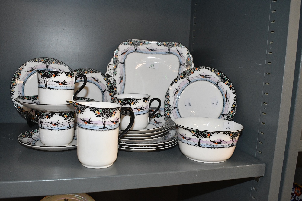 An early 20th-century Art Deco-style Shelley 'Swallows and Balloon Trees' bone china part tea set,