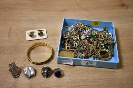 A collection of costume jewellery, including neck chains, rings, cufflinks and statement pieces