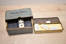 Two vintage sets of dominoes, to include a Wills's Woodbine example in the original tin and a