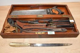 An unusual 19th-Century Surgical Amputation Set, housed in a brass bound mahogany box with a brass