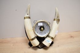 A late 20th-century Shortland Smiths Viking-style barometer, featuring a central circular aneroid
