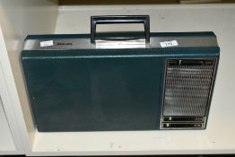 A 1970s Philips 22GF403 portable suitcase record player with hinged record deck and sliding