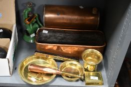 A selection of late 19th to early 20th-century brass and copper wares, to feature a copper bed