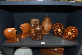 A selection of 20th-century sundry wood ware, to feature a pair of bookends shaped as sailing ships;