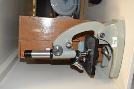 A mid to late 20th-century Japanese Opax microscope, No. 6071, accompanied by wooden storage box,