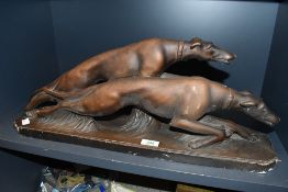 A large 20th-century Art Deco-style gilt plaster Greyhound model, to feature two running