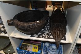 A small selection of presumed 20th-century African Tribal Art, to feature a large dark hardwood
