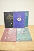 A group of five New Zealand Post stamp collection year books 1988-1992, appear to be complete and in