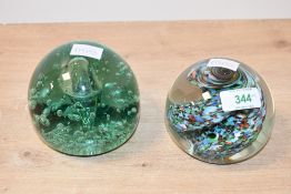 A large Victorian Dump-style paperweight, featuring controlled bubble detailing surrounding a